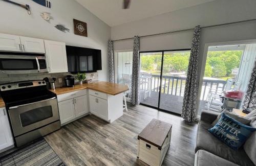 Osage Beach Apartment | F Lakefront! Remodeled, Sleeps 4, Boat Slip, Patio, WiFi, Cable, Pool