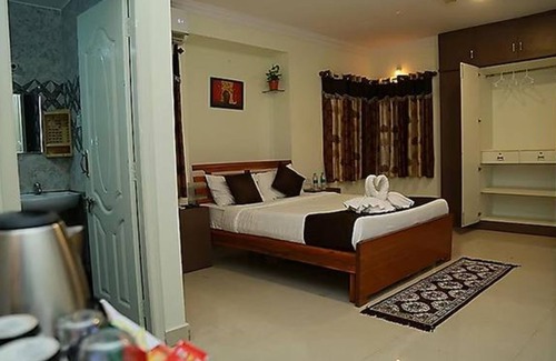 Vyalikaval HBCS Layout Hotel | Fabexpress Mann Pasand Inn
