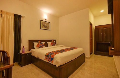 Thalayathimund Hotel | FabHotel Greenwood Stays