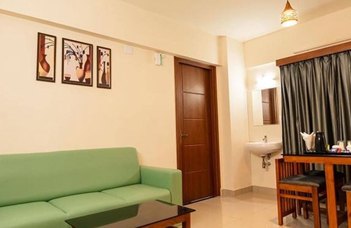 Kaloor Hotel | Fabhotel Jk Grand