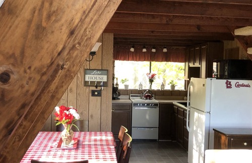 Innsbrook Cabin | Fabulous chalet surrounded by a lake with rocked shoreline for water fun!