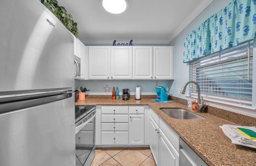 Indian Shores Condo | FABULOUS ! !DIRECT"WATERFRONT"1st FloornWalk to Beach! COZY King Bed