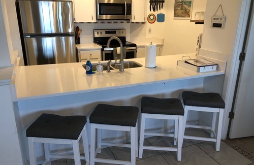Bradenton Beach Condo | Family beach condo. Steps to sand and restaurants + bars!