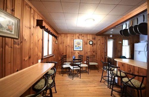 South Casco House | Family compound on Thomas Pond featuring main house and two small cottages.