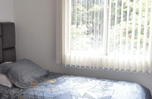 Suba Apartment | Family friendly - 24 hr security walking distance to mall
