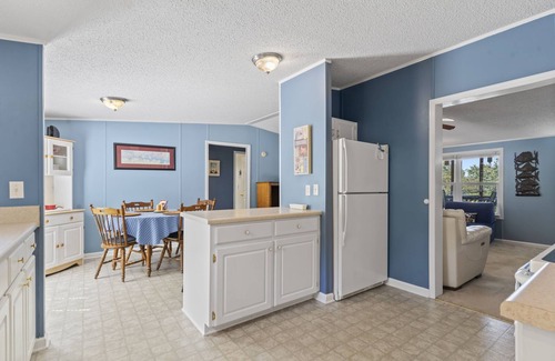 Greenwood House | Family - Friendly Lakefront Home with a Covered Boat-slip.