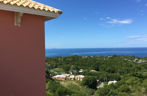 Borinquen Apartment | Family- friendly penthouse in Aguadilla! Close to beaches and restaurants.