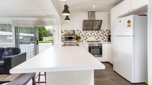 Banksia Beach House | Family Home With Pool and Guest House