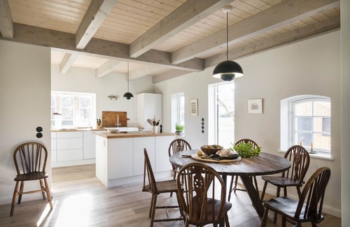 Holzdorf House | Family idyll under thatch with stove and sauna