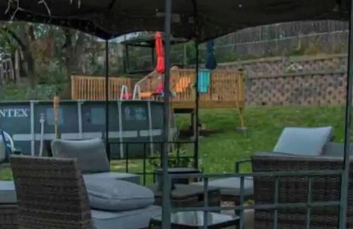 North Central Omaha House | Family-sized home with outdoor pool and deck