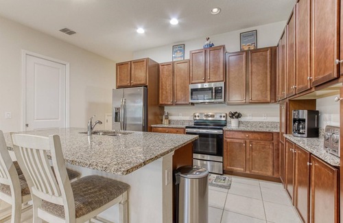 Davenport House | Family-sized townhome with private pool & screened-in patio!