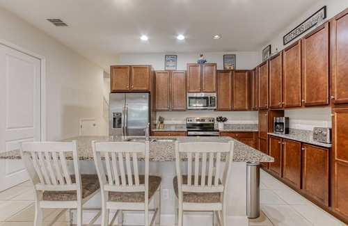 Davenport House | Family-sized townhome with private pool & screened-in patio!