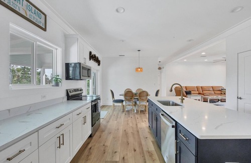 Palm Island House | Family Tides: Beach Pool and Dock.This 4 Bedroom beach house has it all!