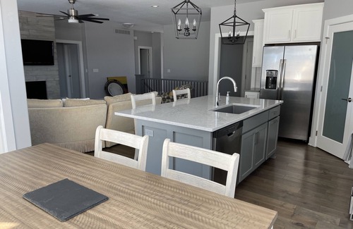 Johnston Villa | Farmhouse style Villa with front porch, 4 bedroom, 3 baths, and 2 living areas