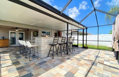 Gibsonton House | Feel like at home with big outdoor space for BBQs and Hot tub. Centrally located