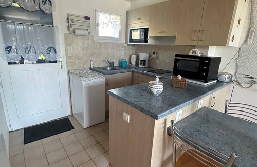Erdeven Condo | Feet in the sand