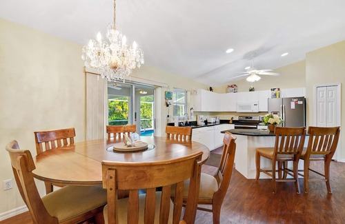Biggar House | Fenced, private, family friendly villa with exotic poolside views near airport.