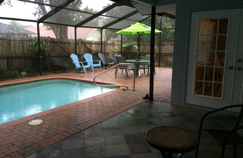 New Port Richey House | Fenced Private Heated Pool and Pet-Friendly