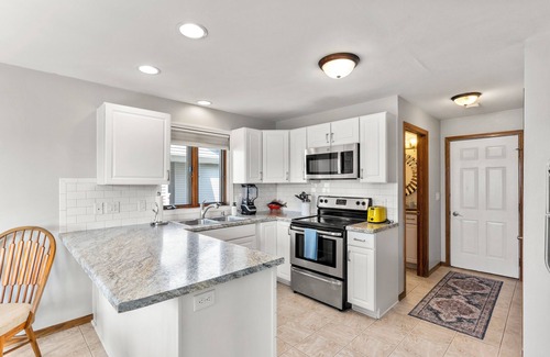 Kimberly House | Fenced yard, 3 BR, 2 King Beds, Shuffleboard, +2 car garage, Dog friendly, Grill