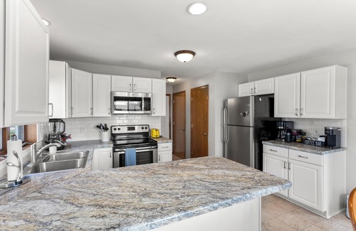 Kimberly House | Fenced yard, 3 BR, 2 King Beds, Shuffleboard, +2 car garage, Dog friendly, Grill