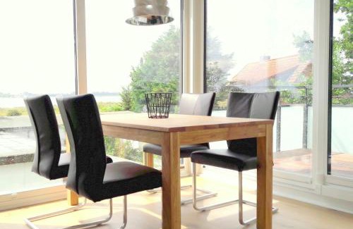Fehmarnsund House | Ferienhaus Brückenblick 12 A - direkt am Meer
