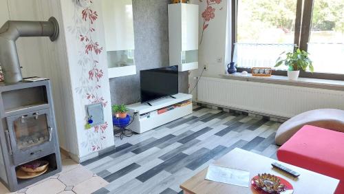 Hitzacker House | Ferienhaus Kunterbunt