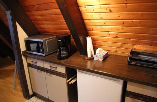Machtlos House | Ferienhaus "Mohnblume"