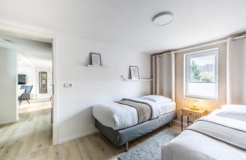 Joachimsthal House | Ferienhaus Seeliebe 70 QM I 2 Schlafzimmer I 5 min zum See I überdachte Terrasse I nahe Werbellinsee