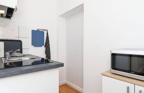 Neuharlingersiel Apartment | Ferienwohnung Dünenrose - Ferienwohnungen im Haus Waterkant in Neuharlingersiel