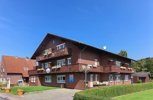 Neuharlingersiel Apartment | Ferienwohnung Polaris - Haus Hafenromantik in Neuharlingersiel