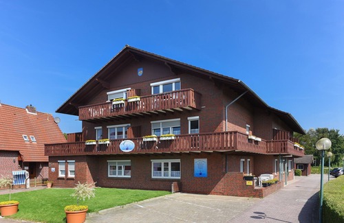 Neuharlingersiel Apartment | Ferienwohnung Polaris - Haus Hafenromantik in Neuharlingersiel