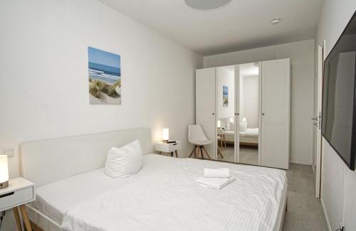 Gross Zicker Apartment | Ferienwohnung mit eigener Sauna und Terrasse- Haus Inselwind FeWo MEERfamilie