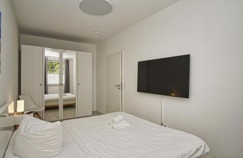 Gross Zicker Apartment | Ferienwohnung mit eigener Sauna und Terrasse- Haus Inselwind FeWo MEERfamilie
