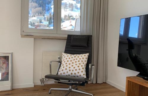 Davos-Dorf Apartment | Ferienwohnung Parsennblick mit Dachterrasse