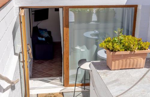 Fertilia Apartment | FERTILIA "Puntanegra Beach" Flat a 30m dal mare