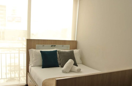 Chico Norte III Apartment | FH ~ Bright studio with balcony. Modern & central.