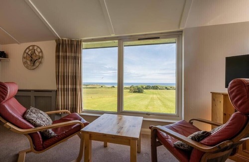 Embleton Cottage | FIDRA, pet friendly, with a garden in Embleton