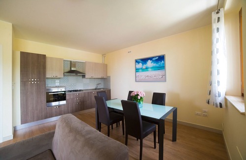 Cupra Marittima Apartment | Finely furnished apartment a stone's throw from the sea with swimming pool, gym, WiFi