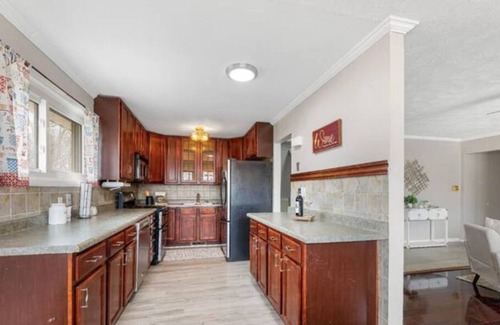 Miller Beach House | Fire pit, bonus, theater room trilevel, near beach, and dunes!