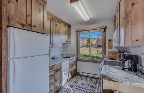 Clark Cabin | Fireplace, and a fully equipped kitchen with a dishwasher and pet friendly!