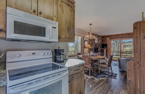 Clark Cabin | Fireplace, and a fully equipped kitchen with a dishwasher and pet friendly!