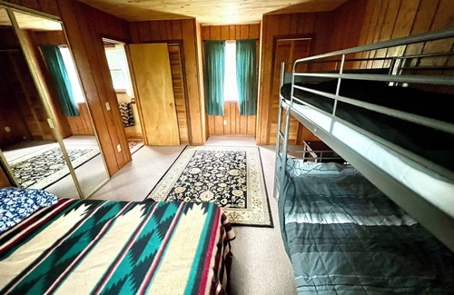 Baldwin Cottage | Fishermen's riverside oasis with fishing dock. Pet friendly.