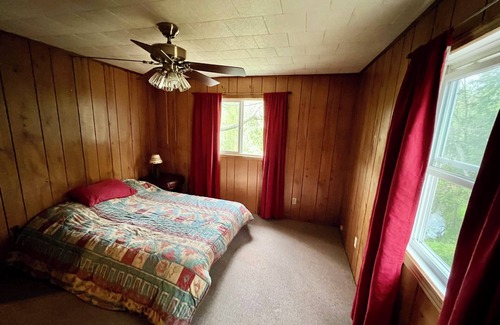 Baldwin Cottage | Fishermen's riverside oasis with fishing dock. Pet friendly.