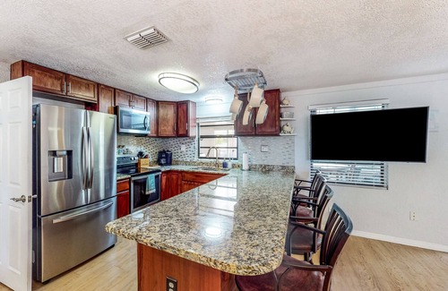 Ruskin House | Fishing getaway with a pool, hot tub, game room, dock, and grill - dog-friendly
