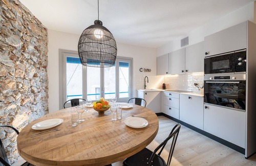 L'Escala Apartment | Florida: Stylish Downtown Duplex with Sea Views
