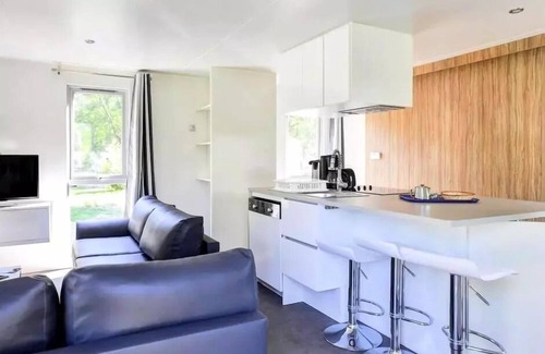 Saumur House | Flower Camping L'Ile d'Offard * - Mobil home Premium 40m2 (2 bedrooms) + CLIM + TV + panoramic terrace + bed linen + towels 4 people