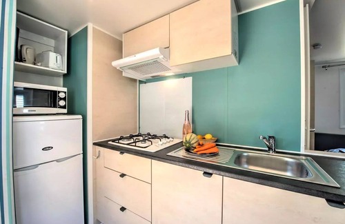 Saumur House | Flower Camping L'Ile d'Offard * - Homeflower Premium 30.5m2 (3 bedrooms) + CLIM + semi-covered terrace + TV + sheets + towels 7 people