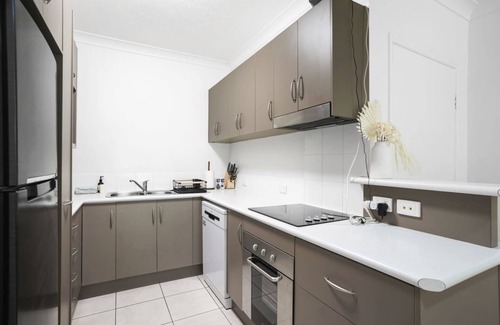 Bungalow Apartment | Focus on Spence - Stylish Poolside Retreat Minutes from Cairns CBD