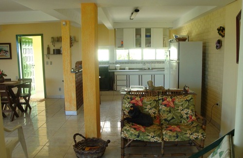 Santinho House | Foot on the sand. 3 bedroom house with 1 suite on the edge of Santinho Beach -