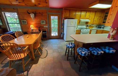Garfield Cabin | FORD'S CREEK CABIN: Secluded Lakefront Rock Cabin in the Woods-Big Lake View